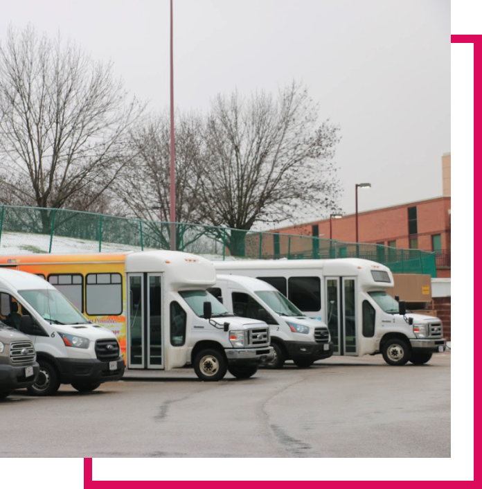 Vehicles lined up in parking lot